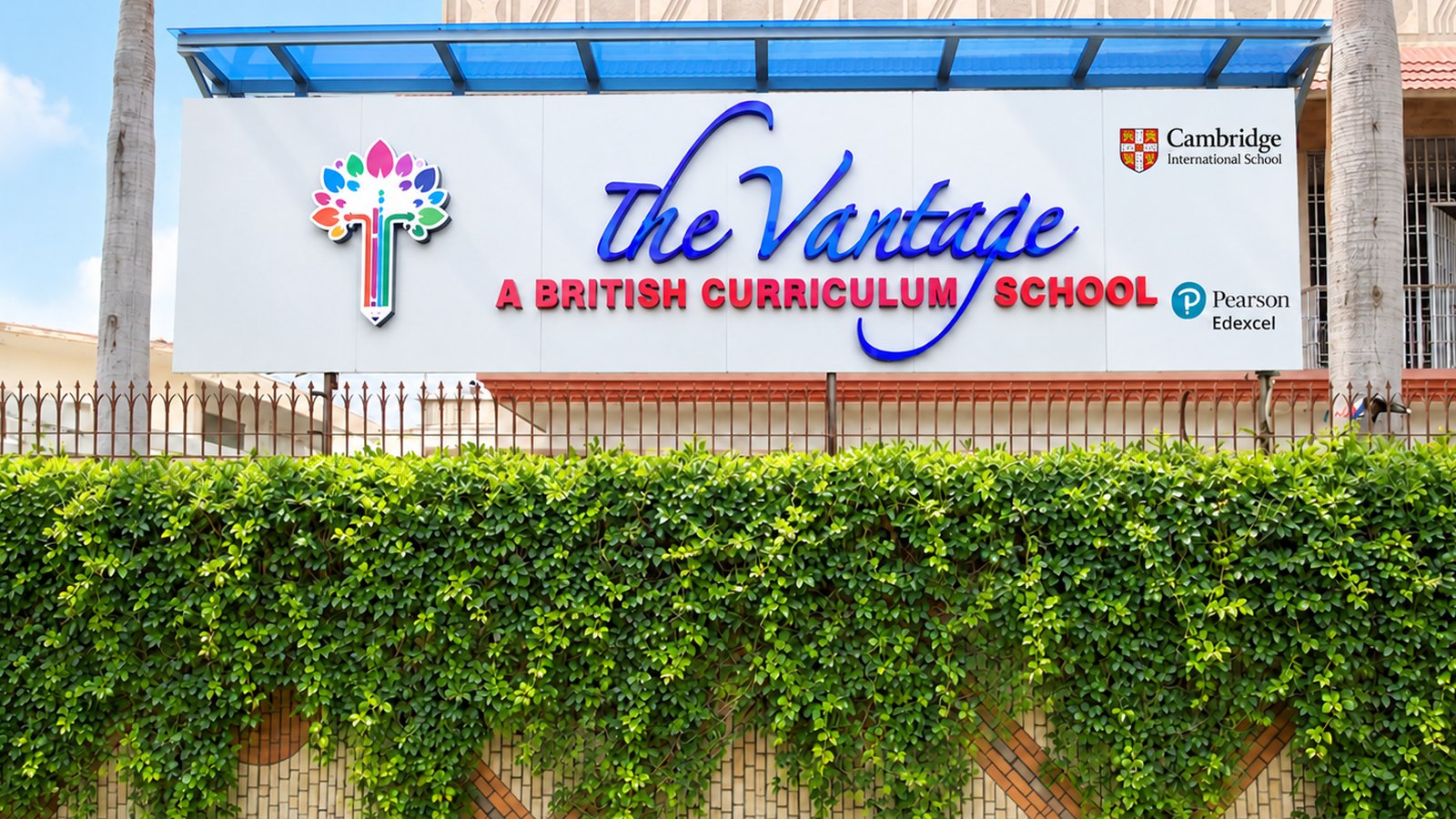 The signboard at the entrance to the Gulshan Chapter, carrying the Cambridge International School and Pearson Edexcel marks
